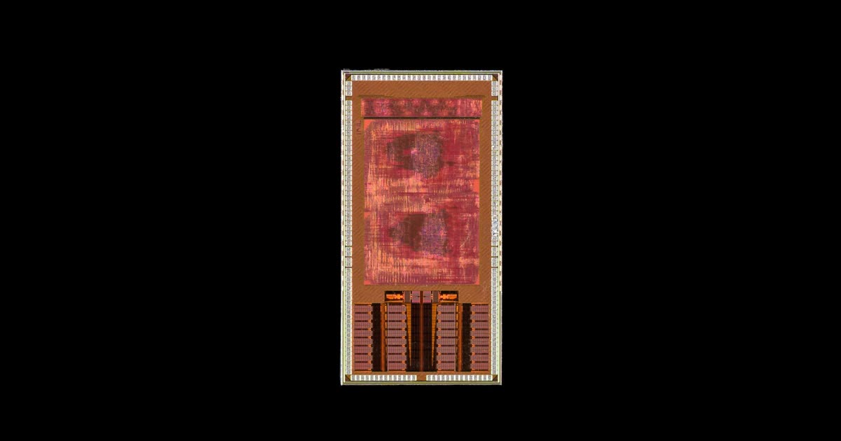 Close-up of EPFL's LogSync brain implant chip, about 4 by 2 millimetres, on a black background