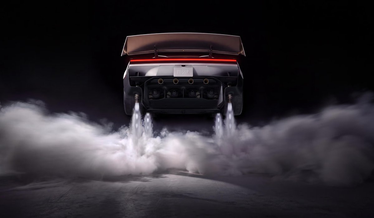 The back of the new Tesla Roadster with its cold-gas thrusters firing and white gas clouds below